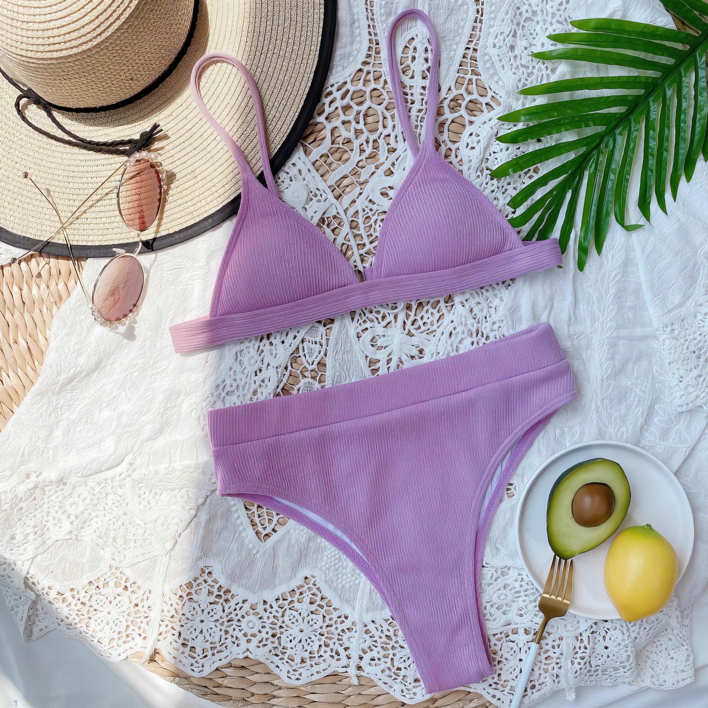 Solid ribbed spaghetti strap bikini set with mid-waist bottoms.