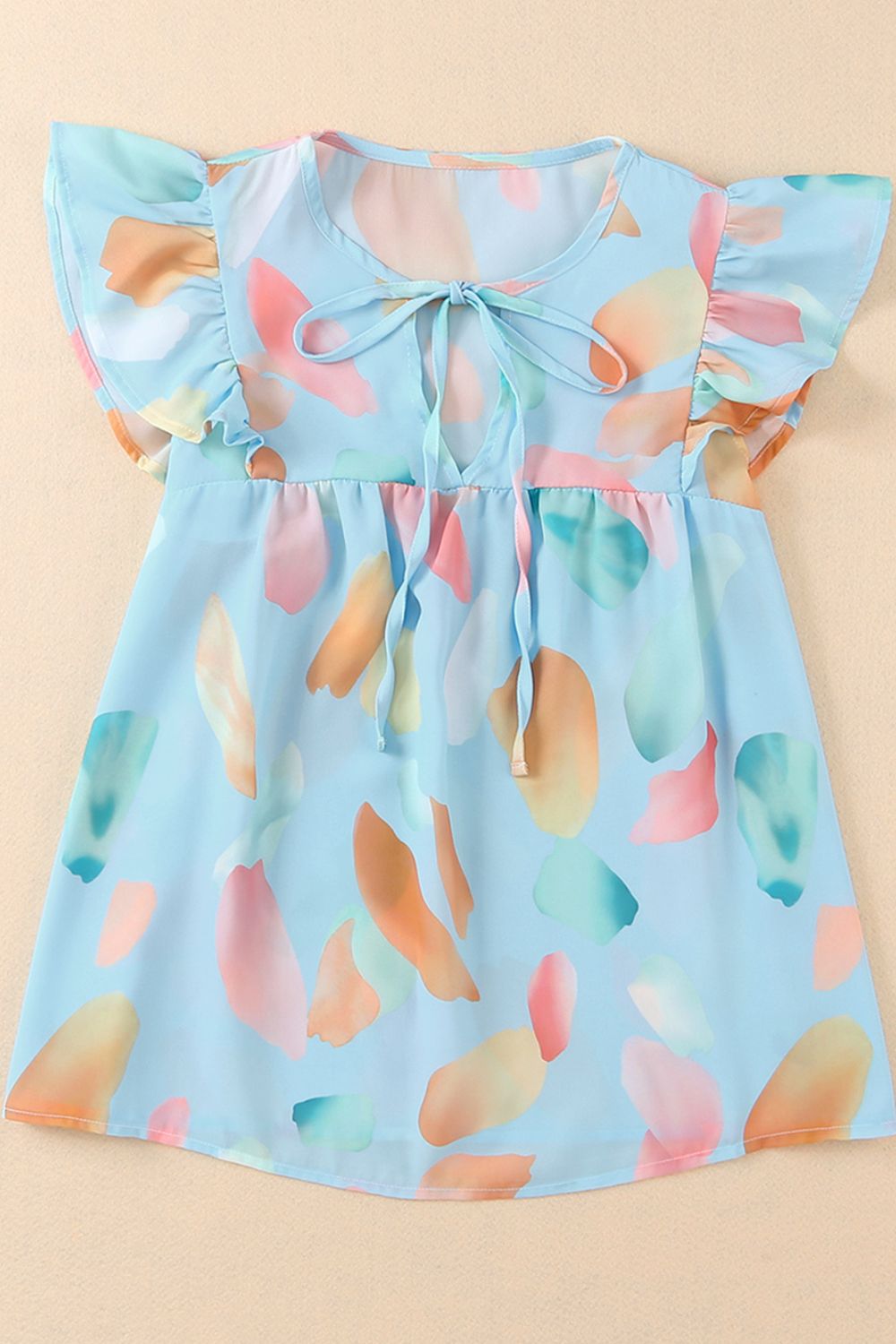 Splotches Pattern Ruffled Cap Sleeve Blouse.