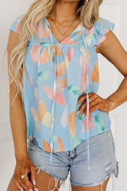 Splotches Pattern Ruffled Cap Sleeve Blouse.