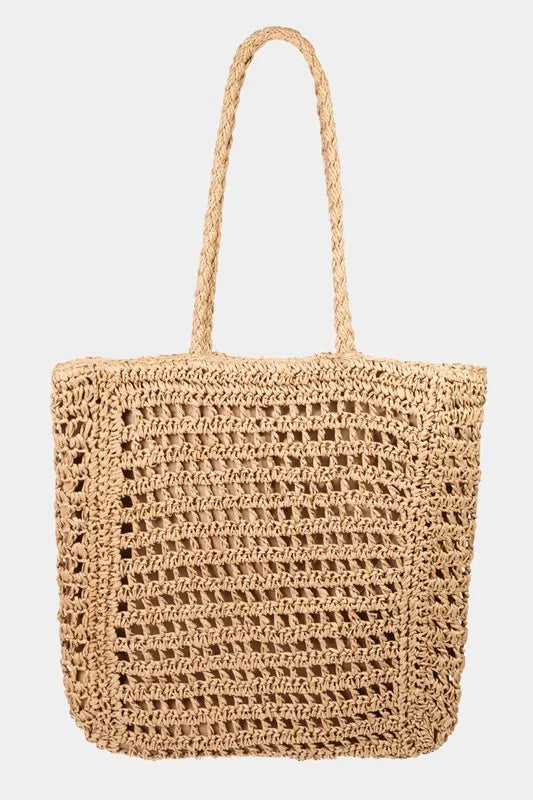 Large straw braided beach tote bag.