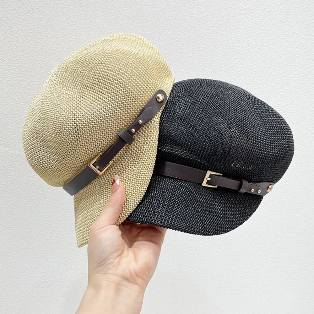 Stylish straw woven hat with a decorative buckle.