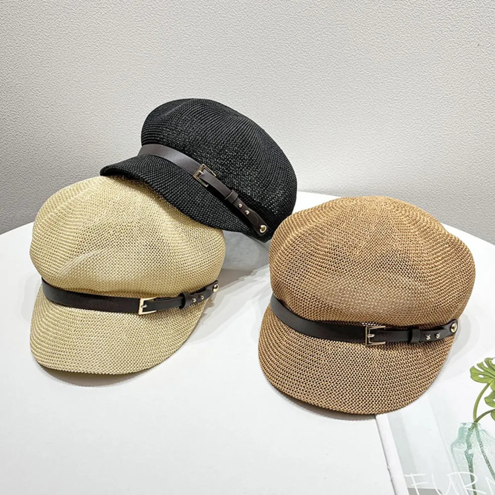 Stylish straw woven hat with a decorative buckle.