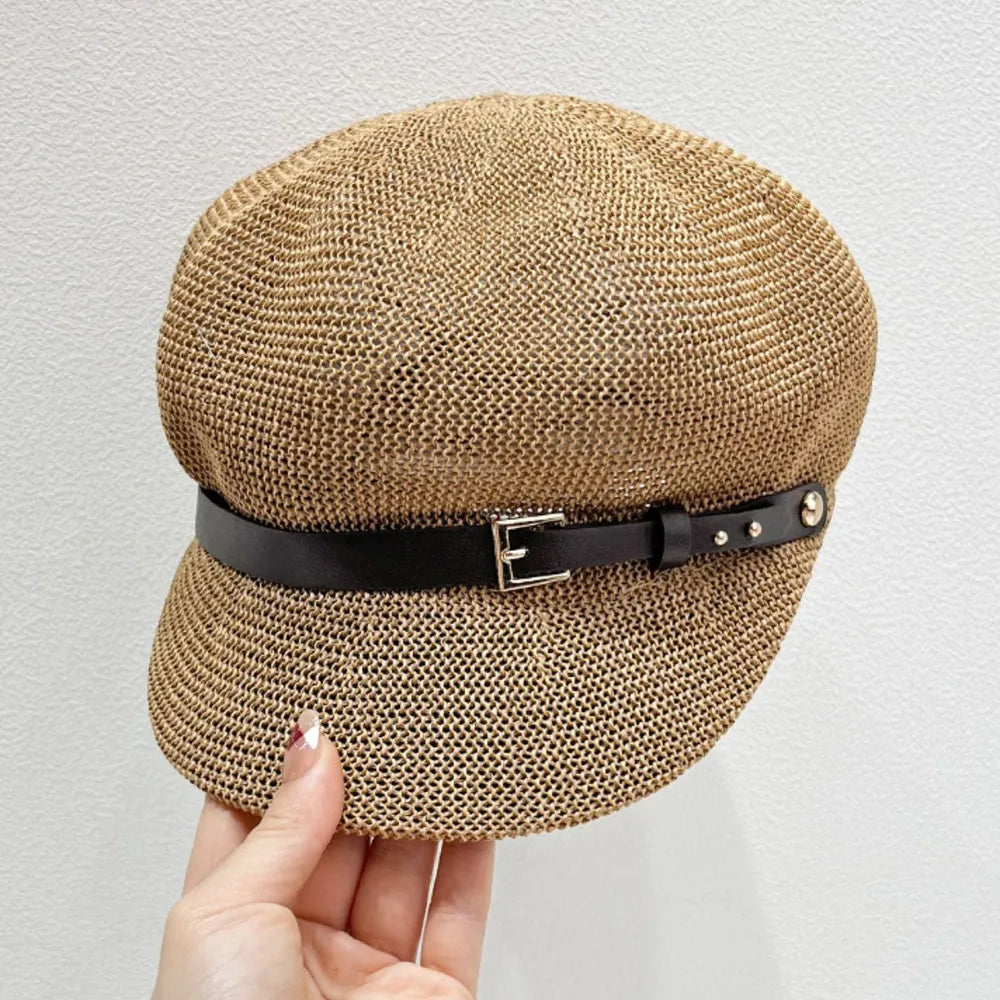 Stylish straw woven hat with a decorative buckle.