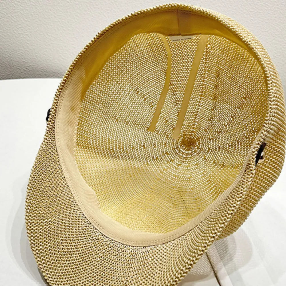Stylish straw woven hat with a decorative buckle.