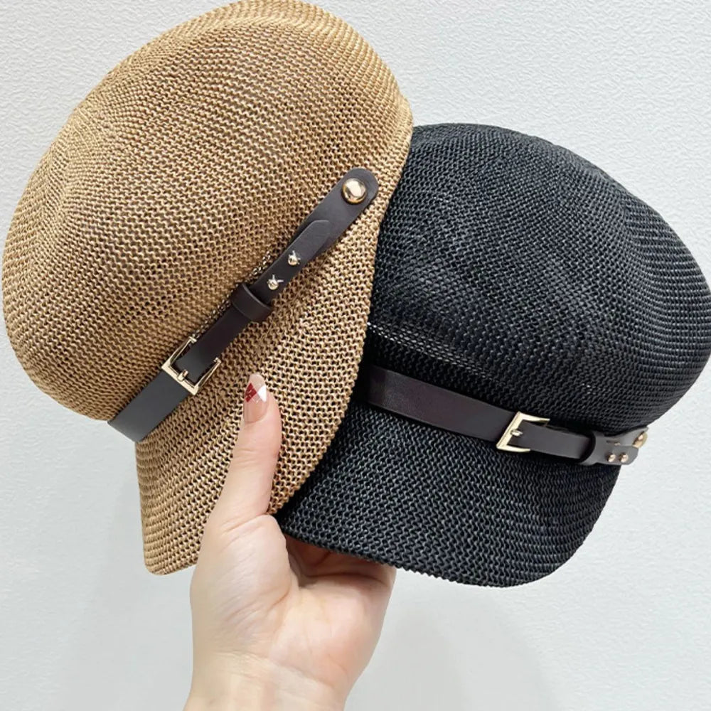 Stylish straw woven hat with a decorative buckle.