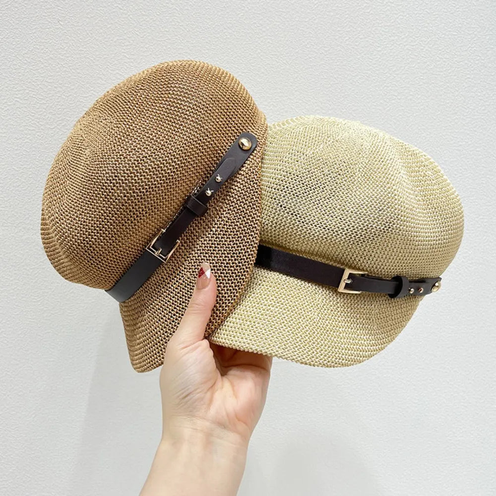 Stylish straw woven hat with a decorative buckle.