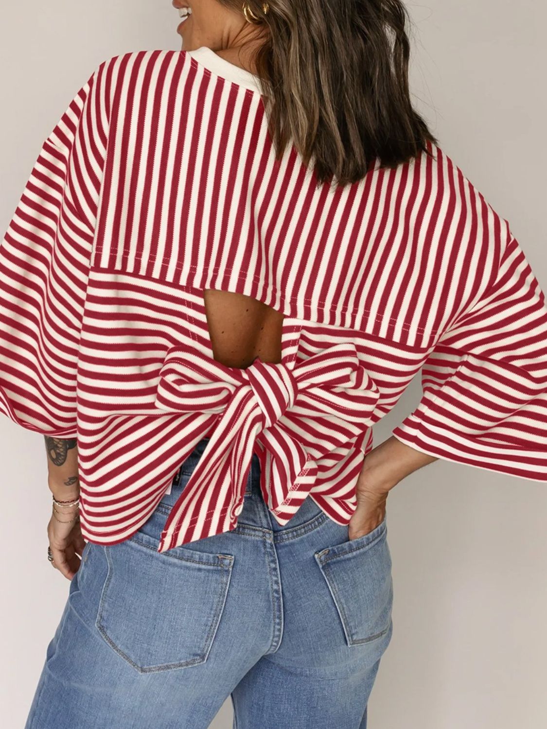 Stripe Bow Decor Cutout Drop Shoulder Top.