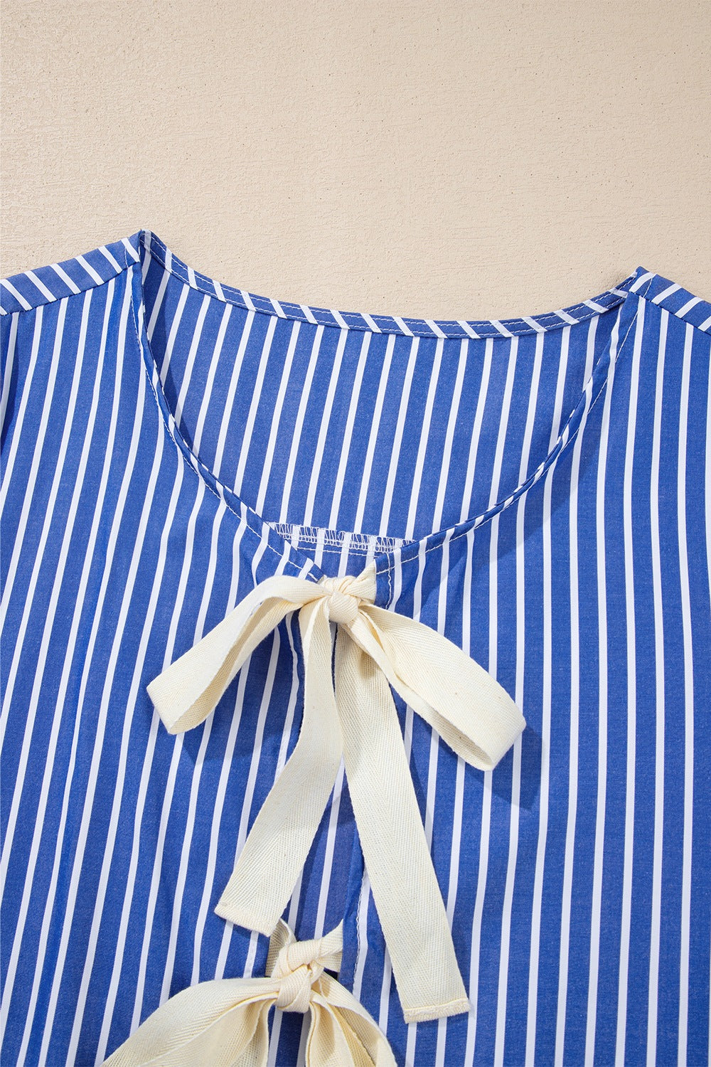 Stripe Tied Front Puff Short Sleeve Top.