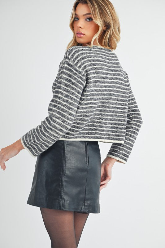 Striped button down round neck cardigan.