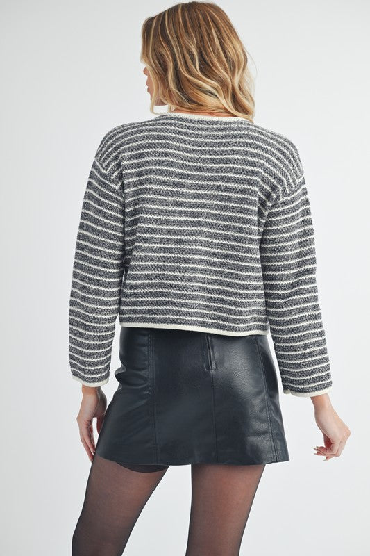 Striped button down round neck cardigan.