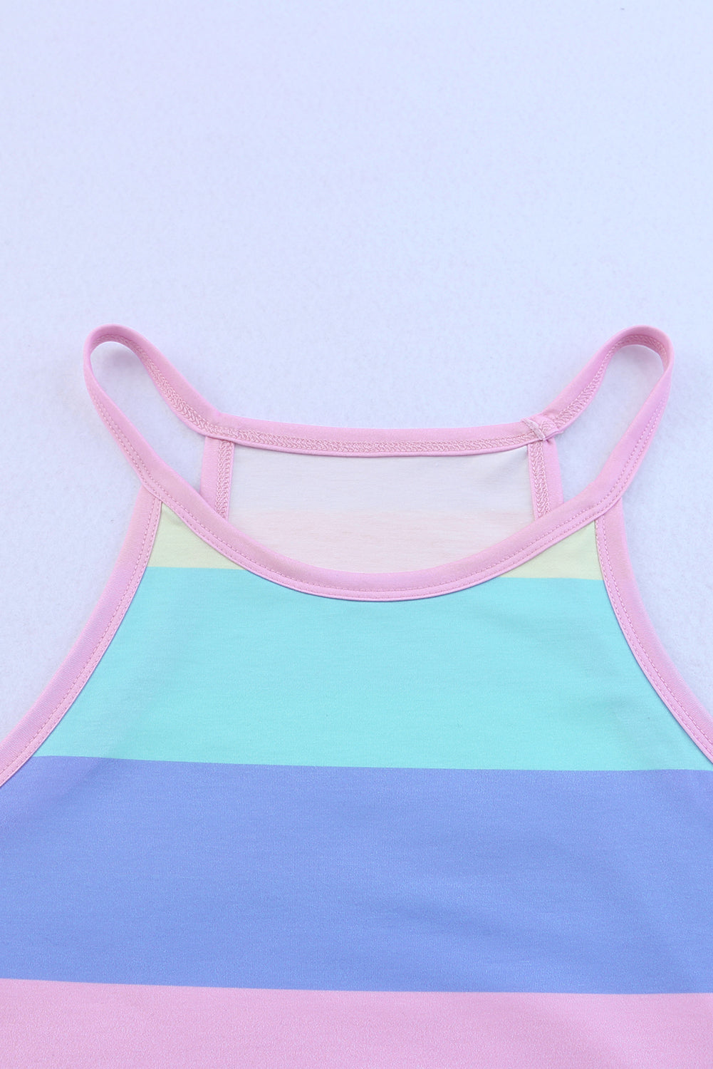 Striped curved hem tank with spaghetti straps, slightly stretchy.