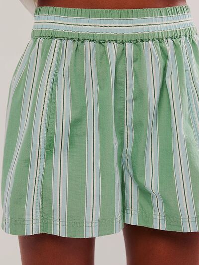 Heart-pattern rolled hem denim shorts with pockets.