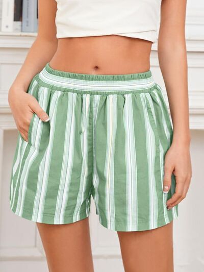 Heart-pattern rolled hem denim shorts with pockets.