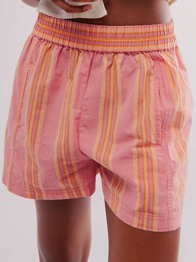 Heart-pattern rolled hem denim shorts with pockets.