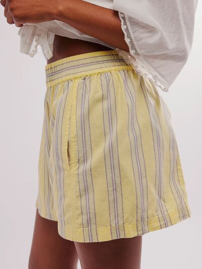 Heart-pattern rolled hem denim shorts with pockets.