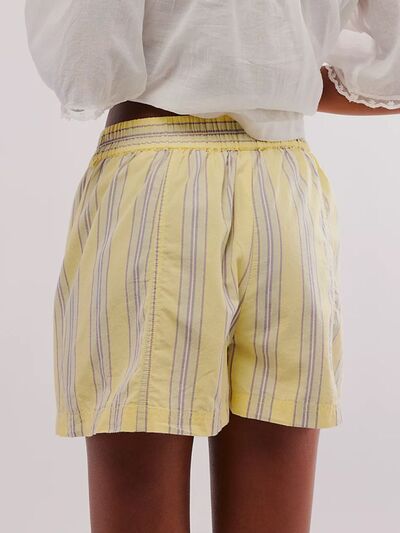Heart-pattern rolled hem denim shorts with pockets.