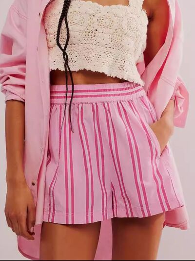 Heart-pattern rolled hem denim shorts with pockets.