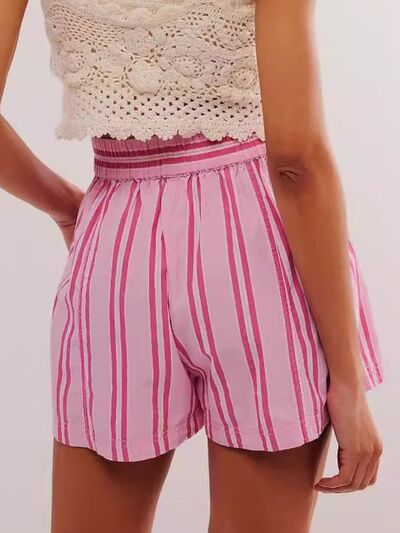 Heart-pattern rolled hem denim shorts with pockets.