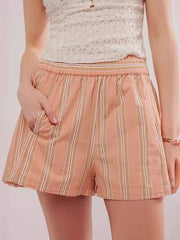 Heart-pattern rolled hem denim shorts with pockets.