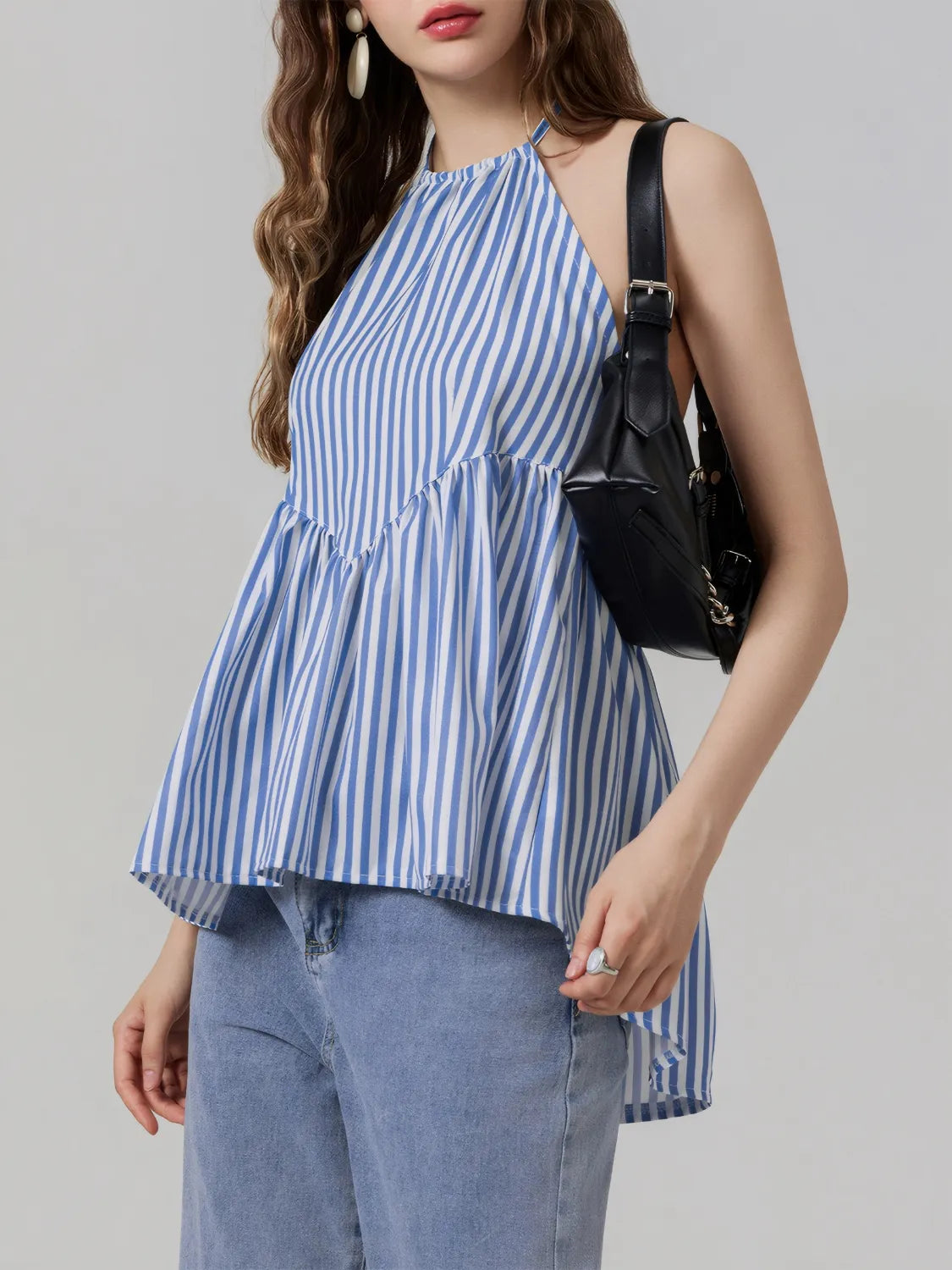 Striped halter neck cami with tie and backless high-low design.