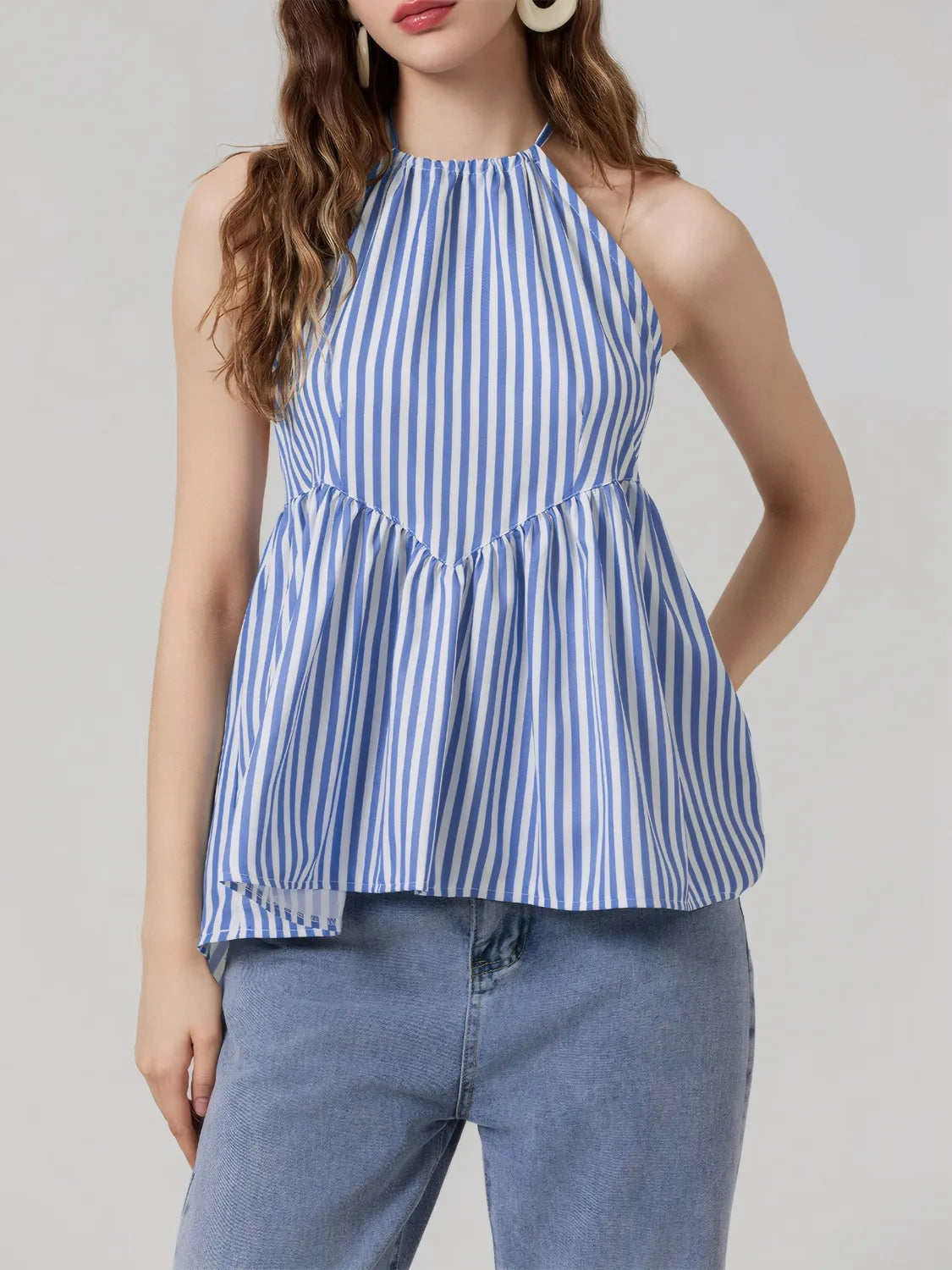 Striped halter neck cami with tie and backless high-low design.