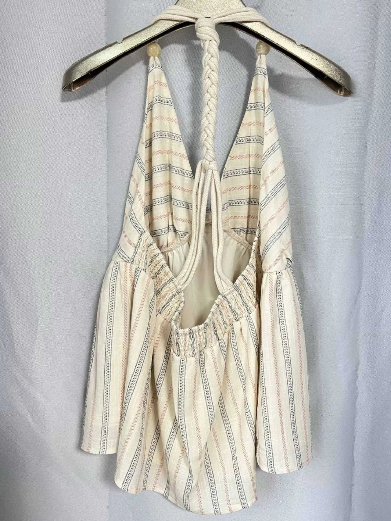 Striped halter neck cami with braided and crisscross smocked details.