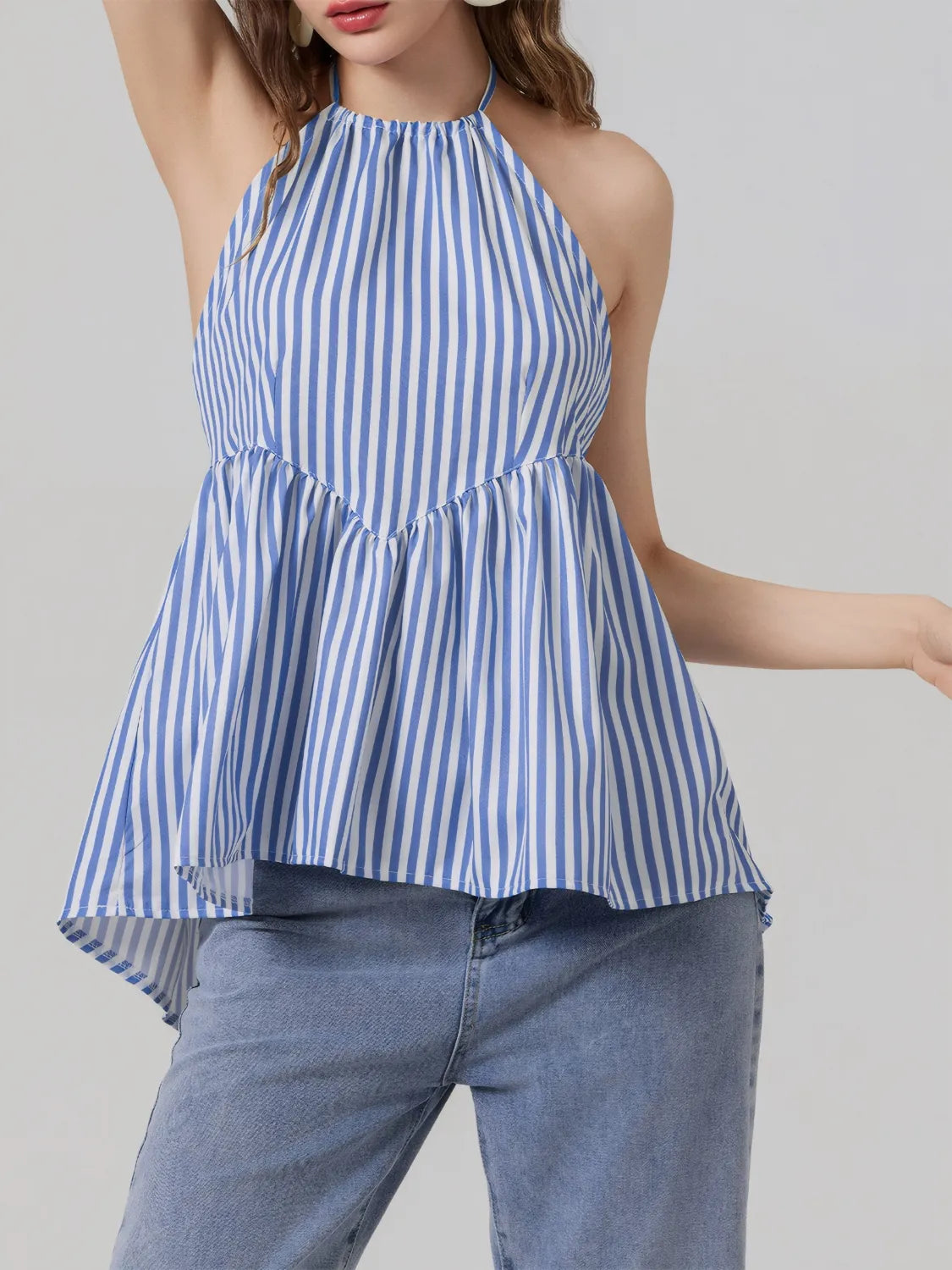 Striped halter neck cami with tie and backless high-low design.