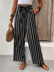 Striped high waist wide leg pants with tie and pockets, opaque.