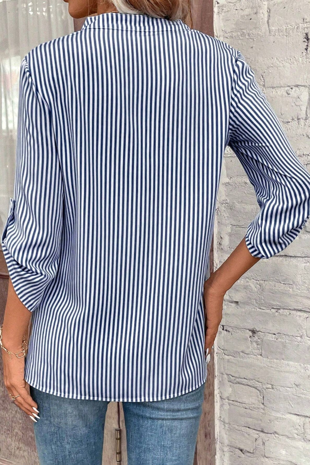 Striped Notched Roll-Tab Sleeve Shirt.