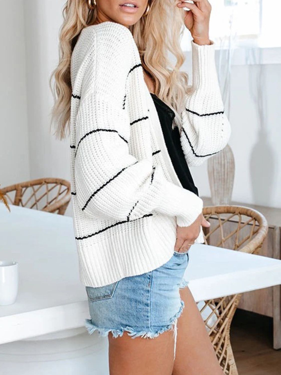 Striped open front long sleeve cardigan.