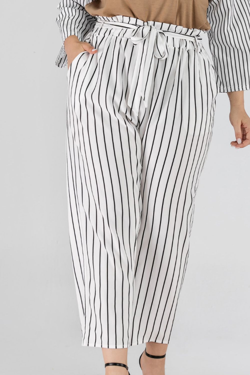 Striped paperbag waist cropped pants, casual style.