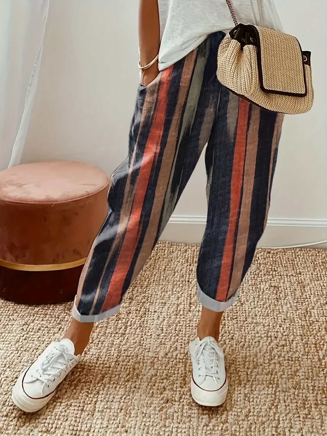 Striped pocketed elastic waist pants, opaque.