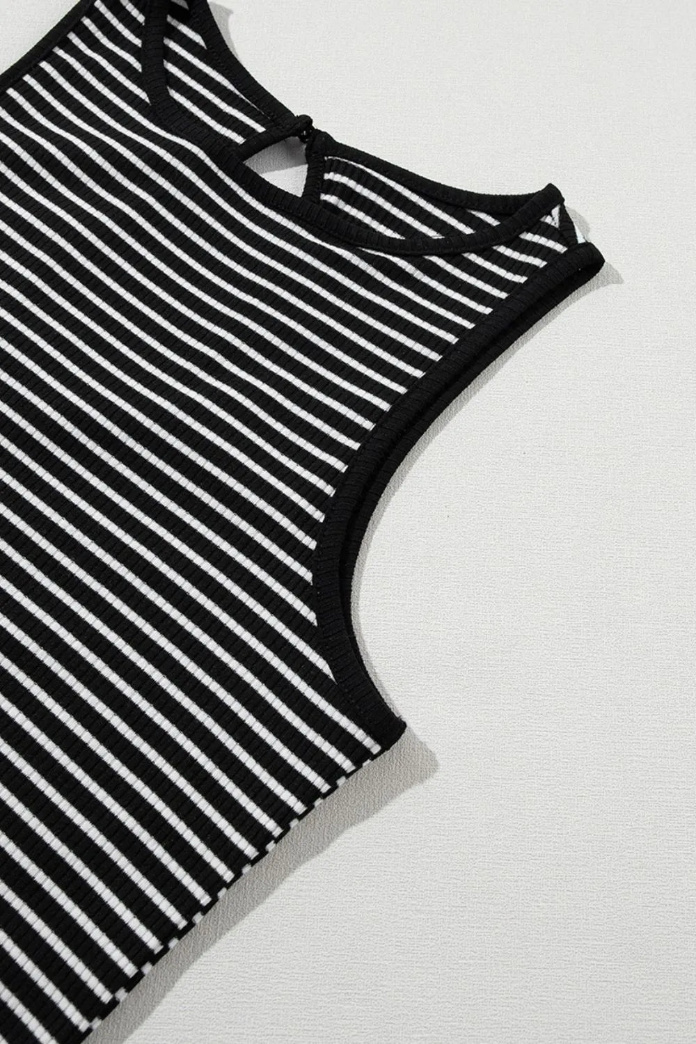 Striped ribbed round neck tank with cutout, opaque and slightly stretchy.