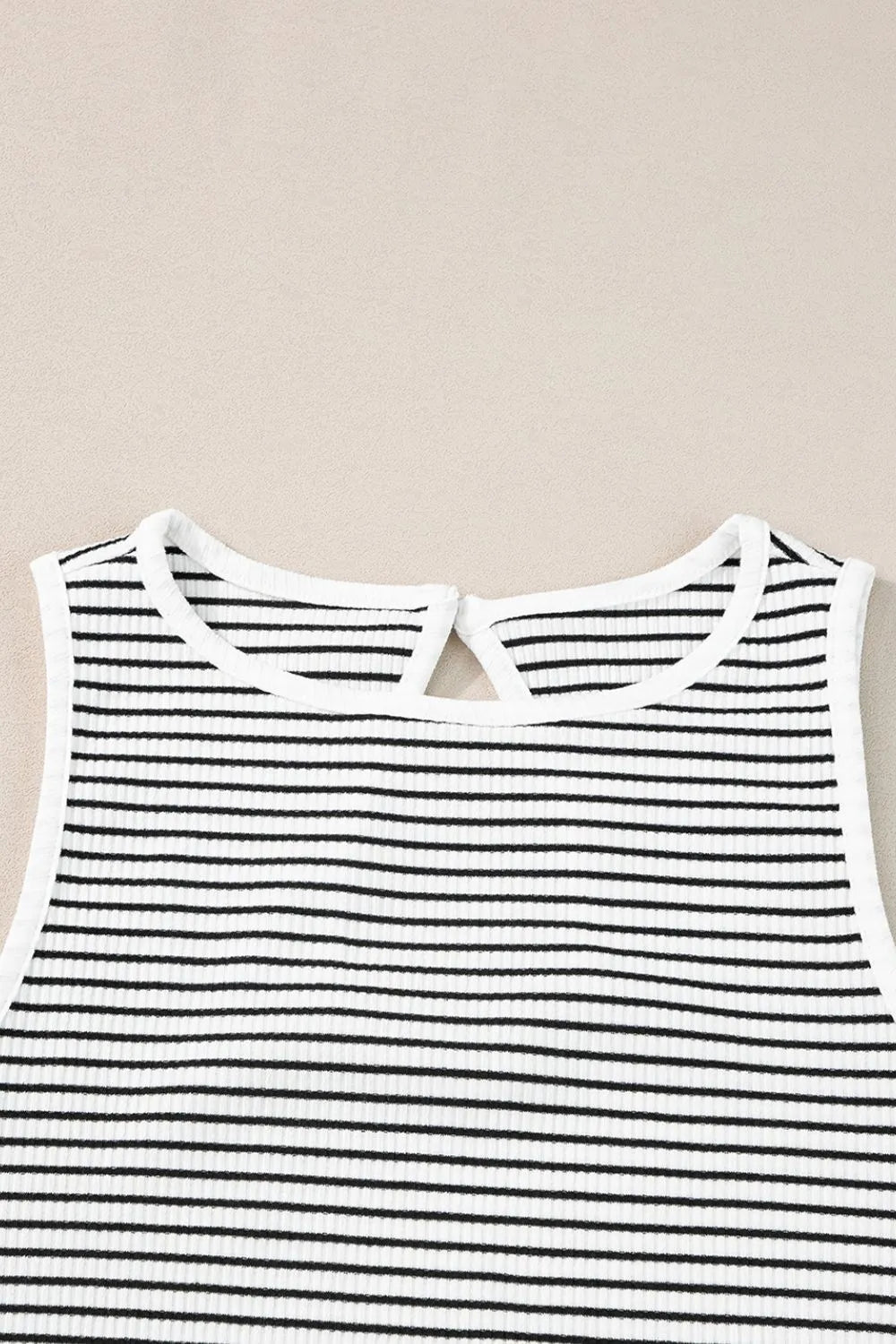 Striped ribbed round neck tank with cutout, opaque and slightly stretchy.