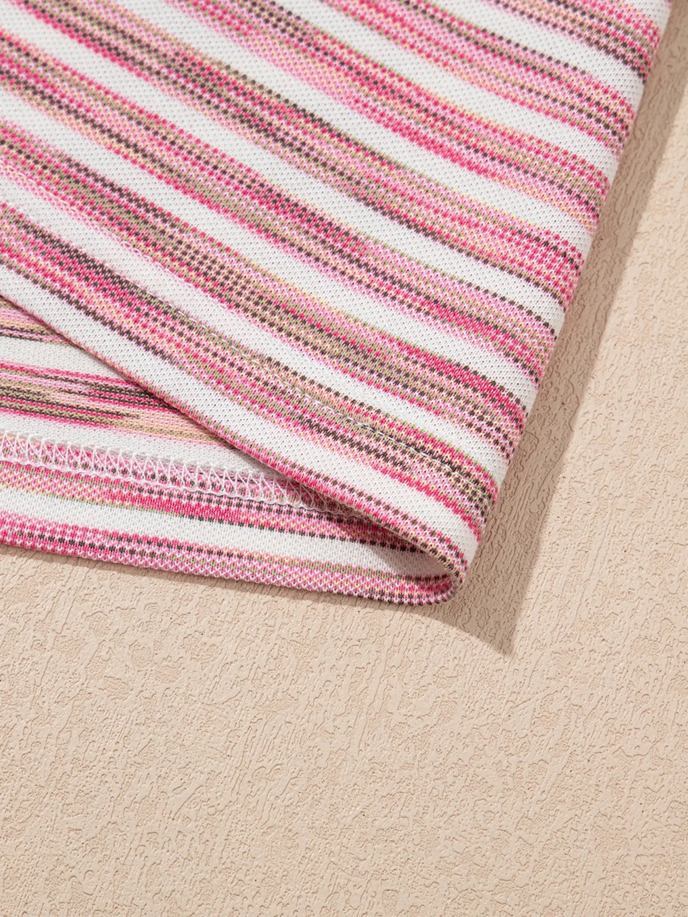 Striped scoop neck tank top, slightly stretchy.