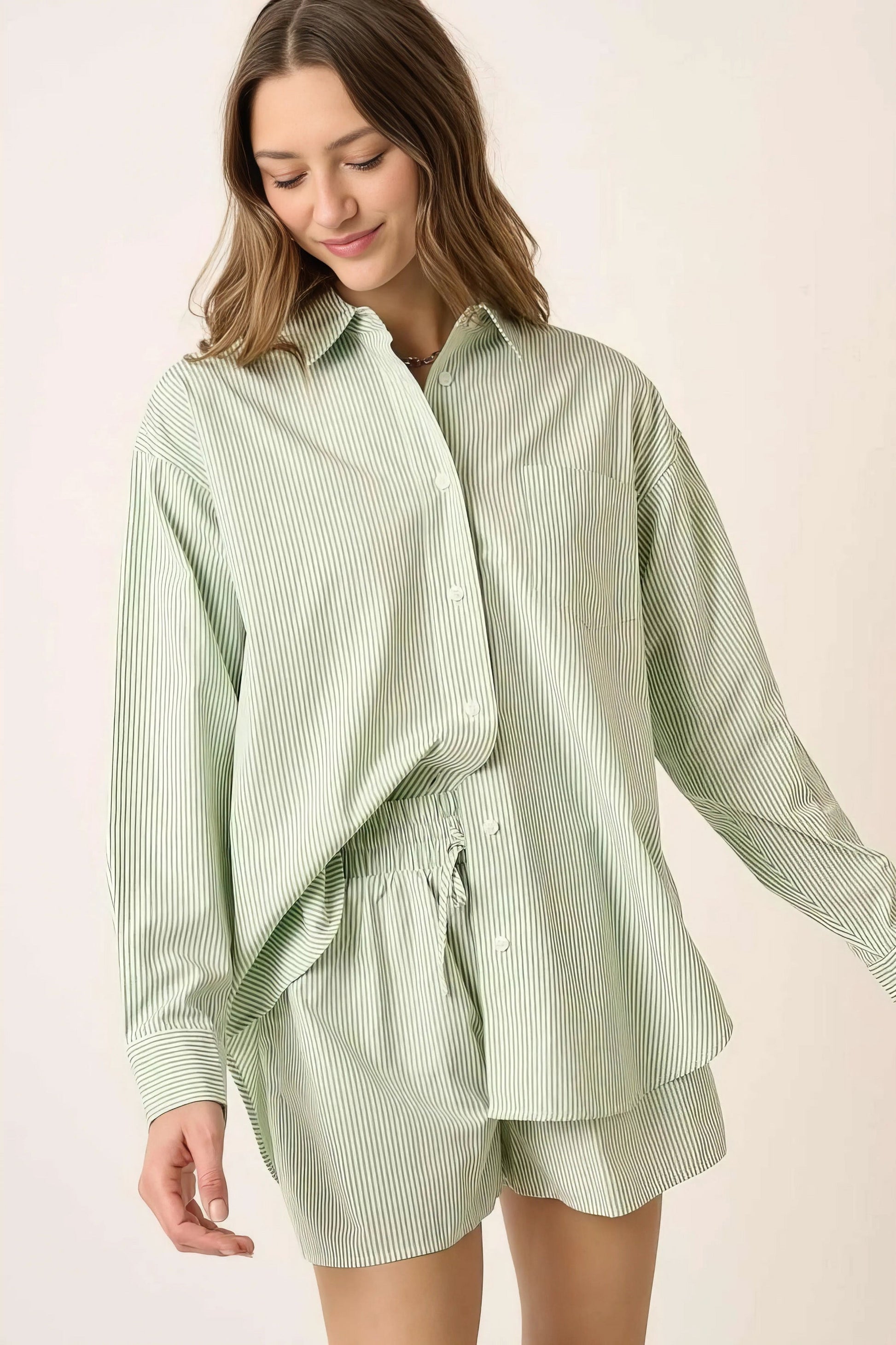 Striped shirt and shorts set, women's coordinated two-piece outfit, classic stripes, comfortable oversized shirt, buttoned details, practical pockets, non-stretch poly cotton blend, ideal for versatile casual wear
