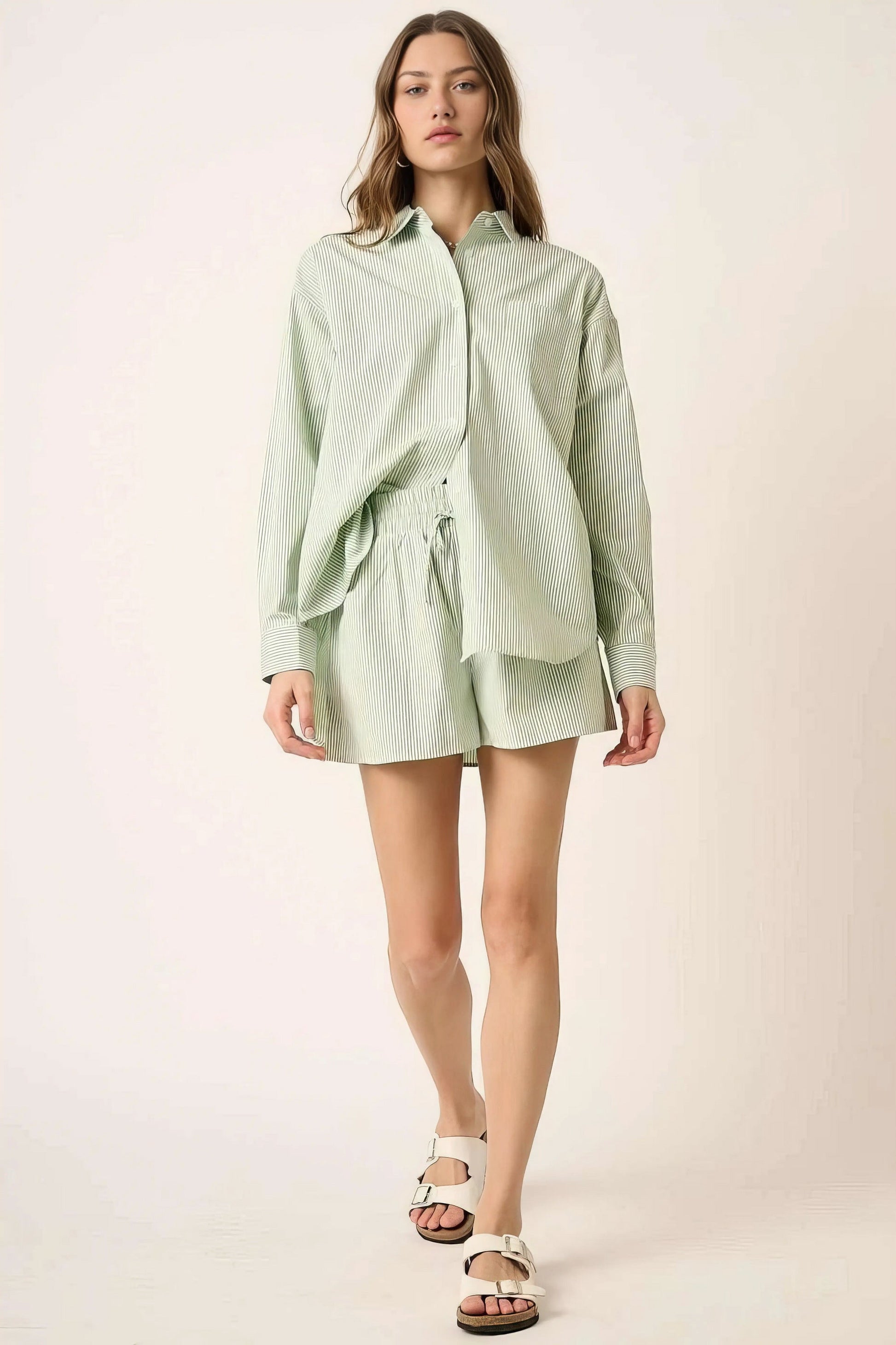 Striped shirt and shorts set, women's coordinated two-piece outfit, classic stripes, comfortable oversized shirt, buttoned details, practical pockets, non-stretch poly cotton blend, ideal for versatile casual wear