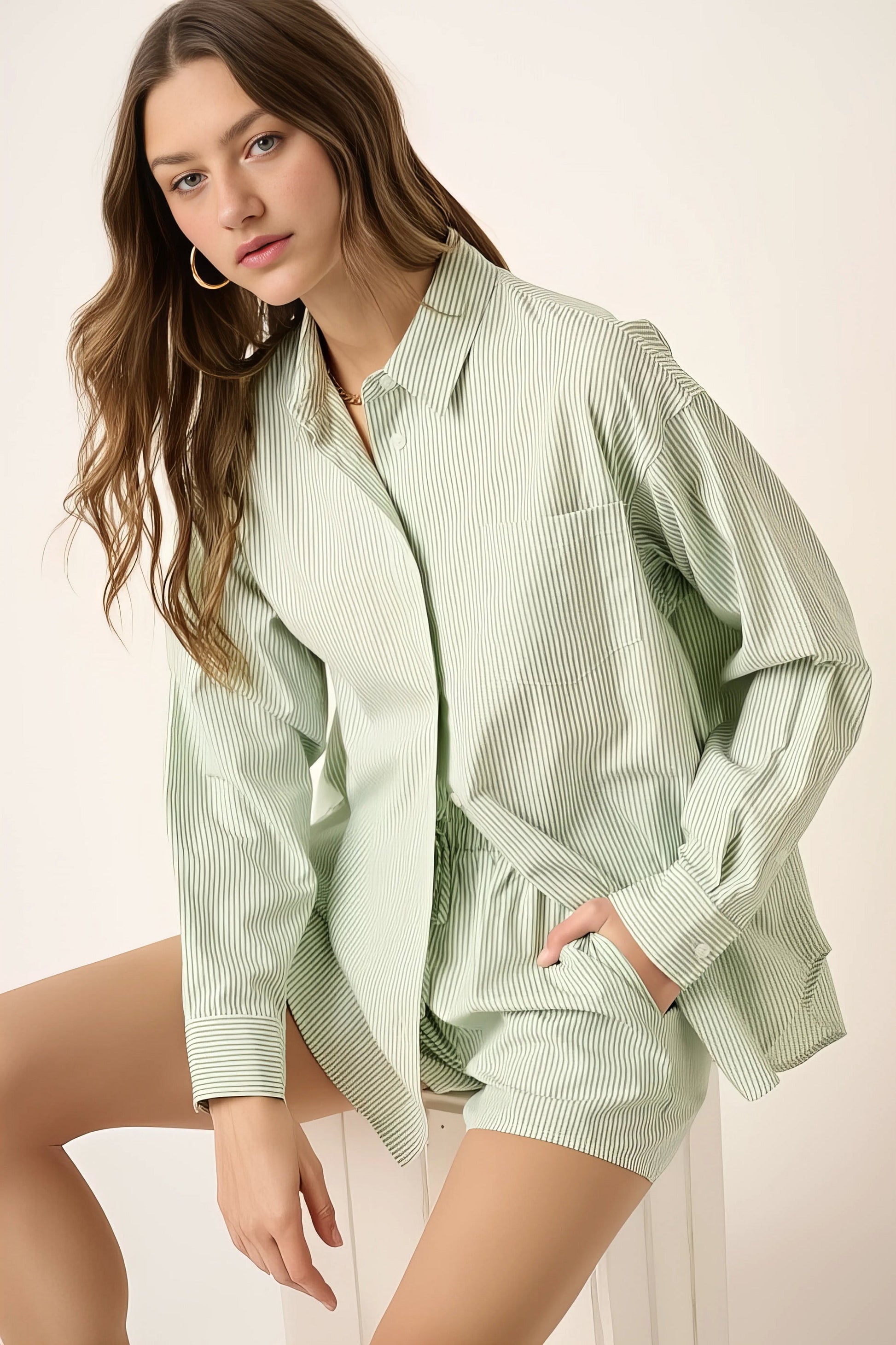 Striped shirt and shorts set, women's coordinated two-piece outfit, classic stripes, comfortable oversized shirt, buttoned details, practical pockets, non-stretch poly cotton blend, ideal for versatile casual wear