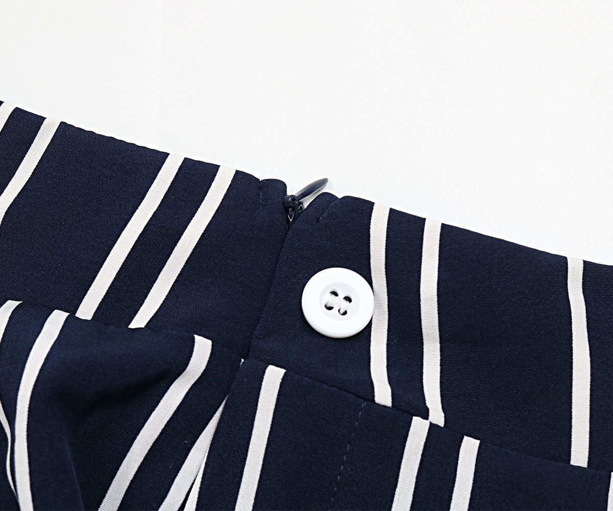 Striped slit wide leg pants with decorative buttons, casual minimalist style.