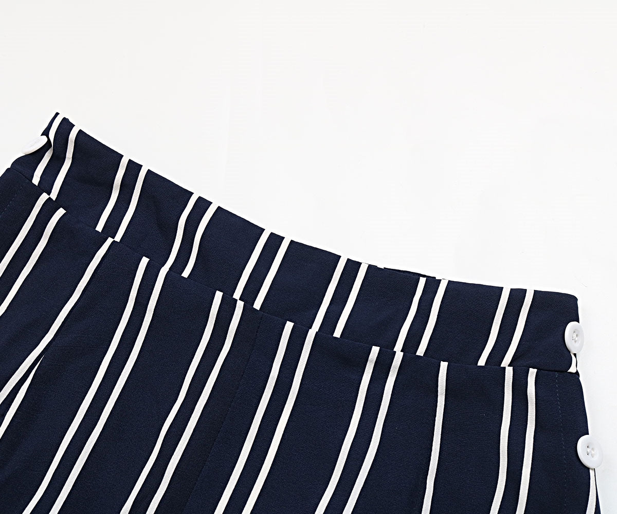 Striped slit wide leg pants with decorative buttons, casual minimalist style.