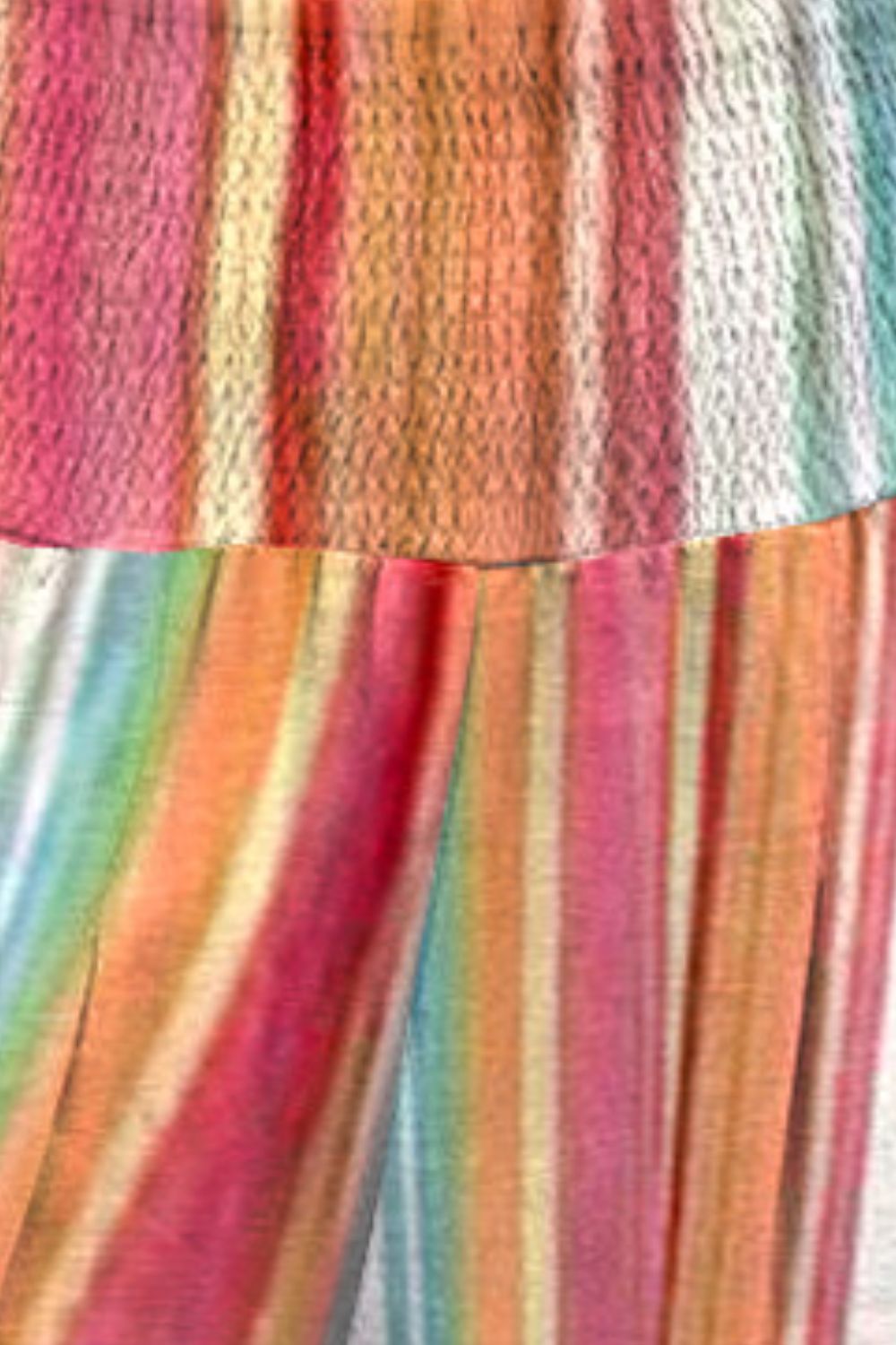 Striped smocked waist pants with pockets, casual style.