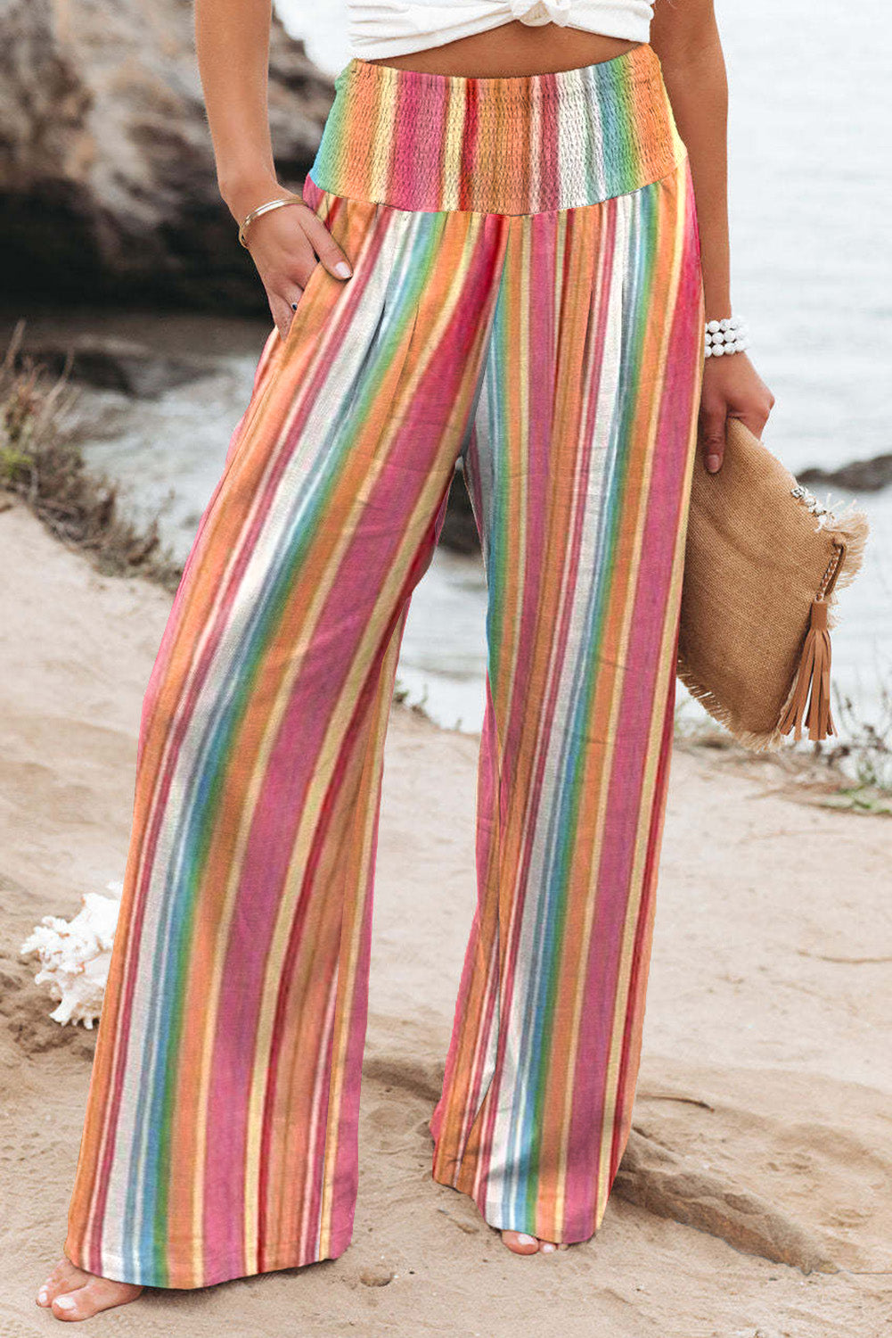 Striped smocked waist pants with pockets, casual style.