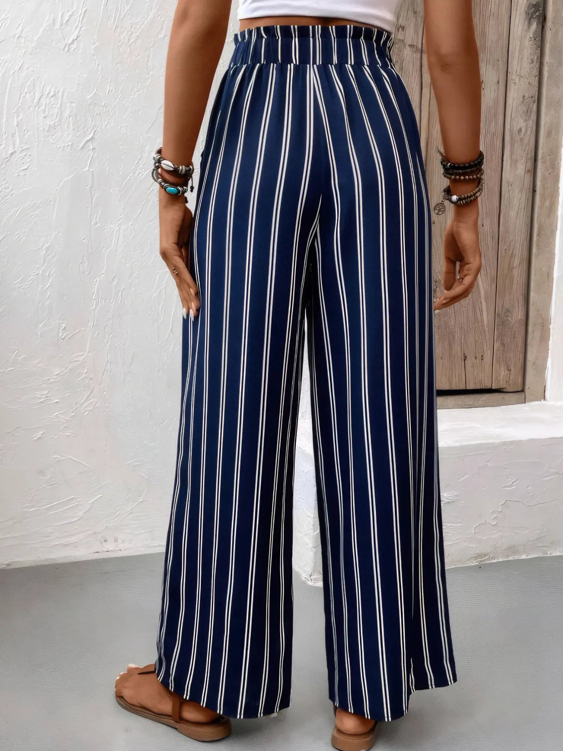 Striped wide leg pants with pockets.