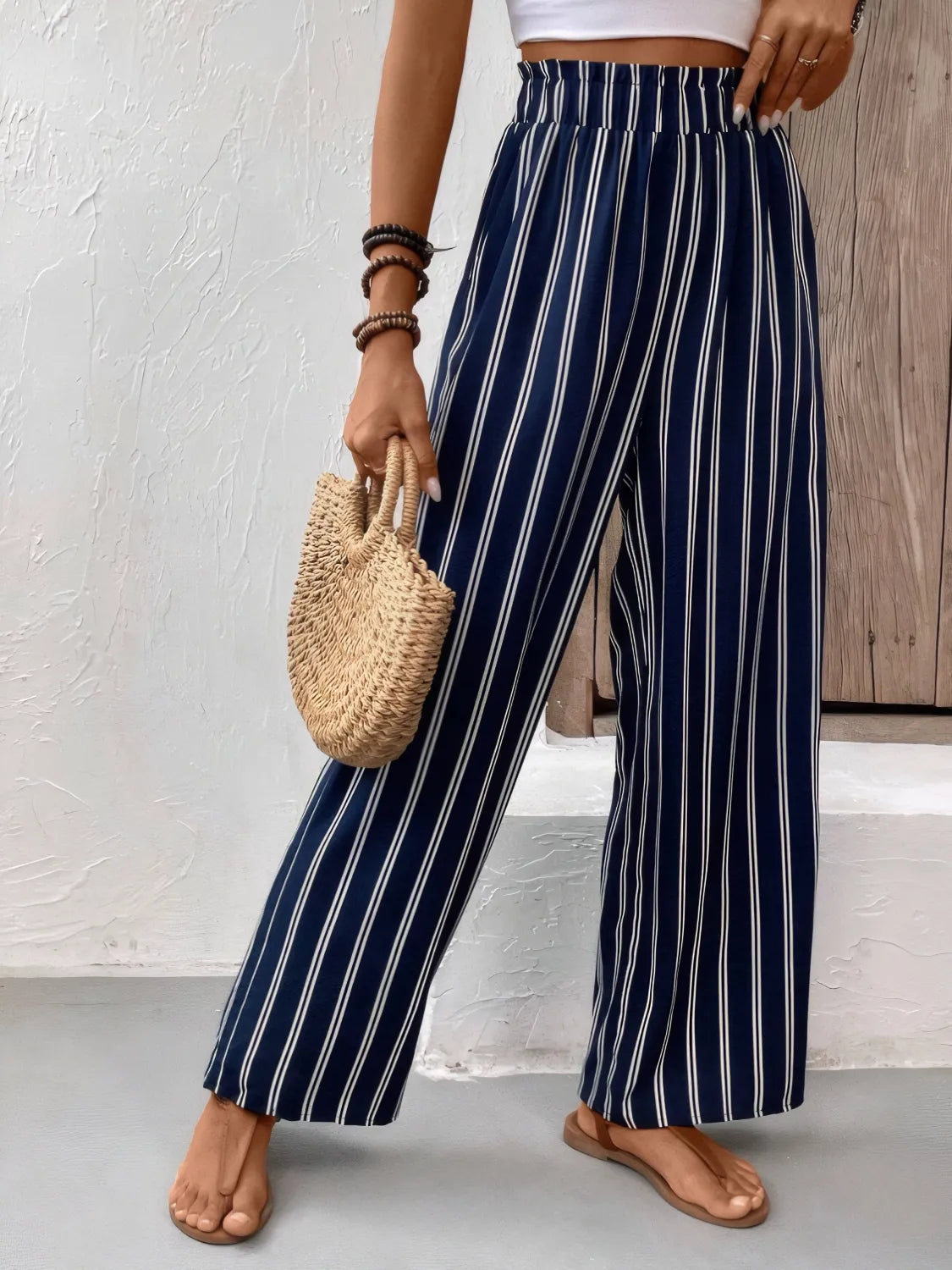 Striped wide leg pants with pockets.
