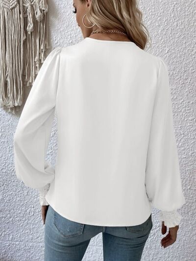 Surplice Smocked Lantern Sleeve Blouse.