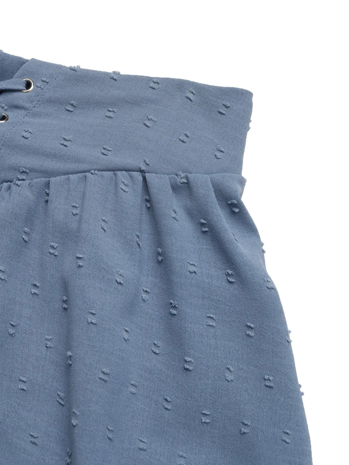 High-waist V-front Bermuda denim shorts with pockets.