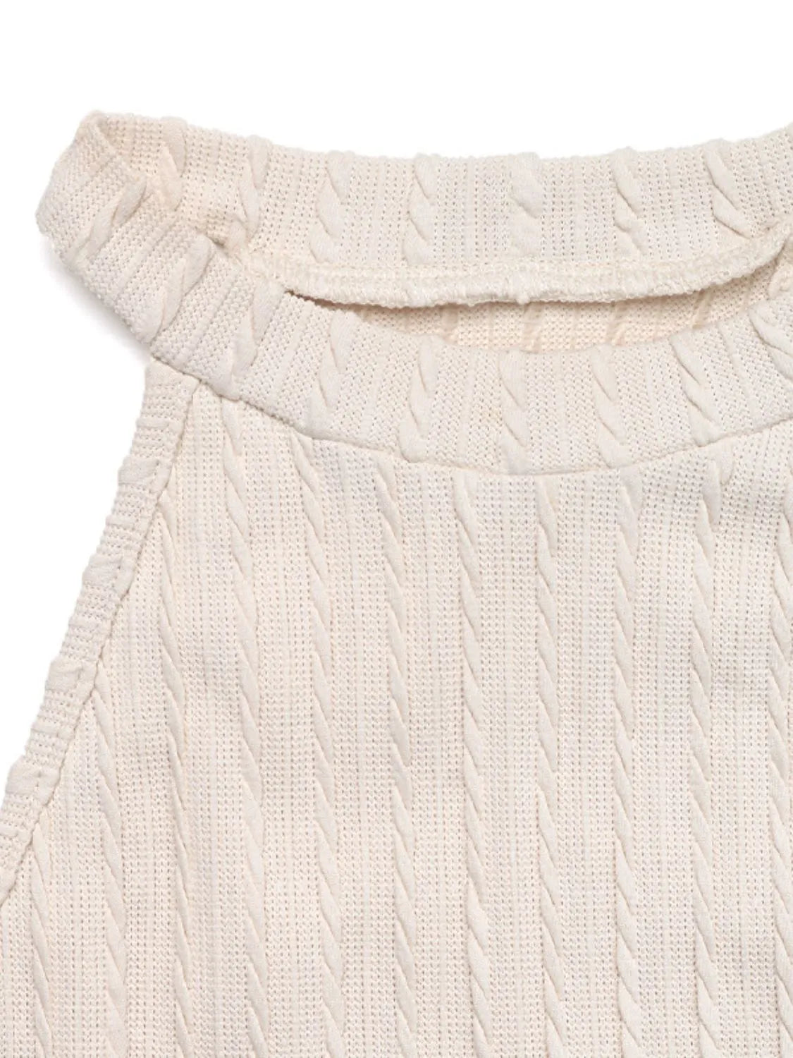Tassel Grecian neck cami, moderately stretchy.