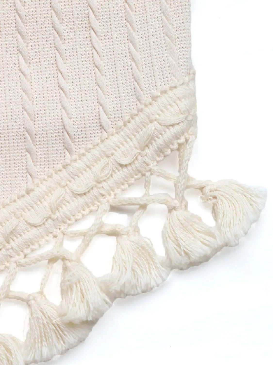 Tassel Grecian neck cami, moderately stretchy.