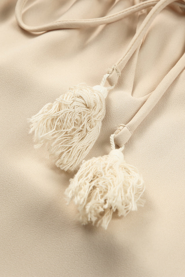 Tassel Tie Neck Long Sleeve Blouse.
