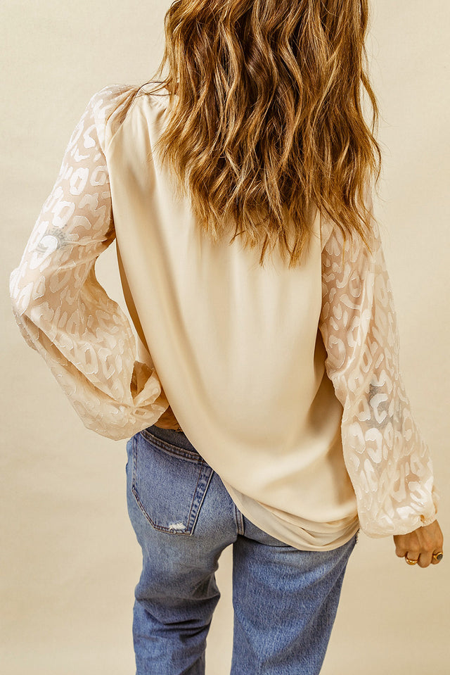 Tassel Tie Neck Long Sleeve Blouse.